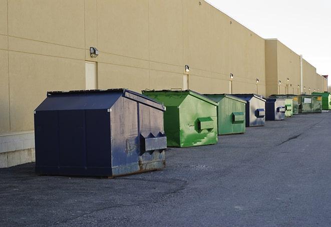 a large metal bin for waste disposal on the construction site in Methuen MA